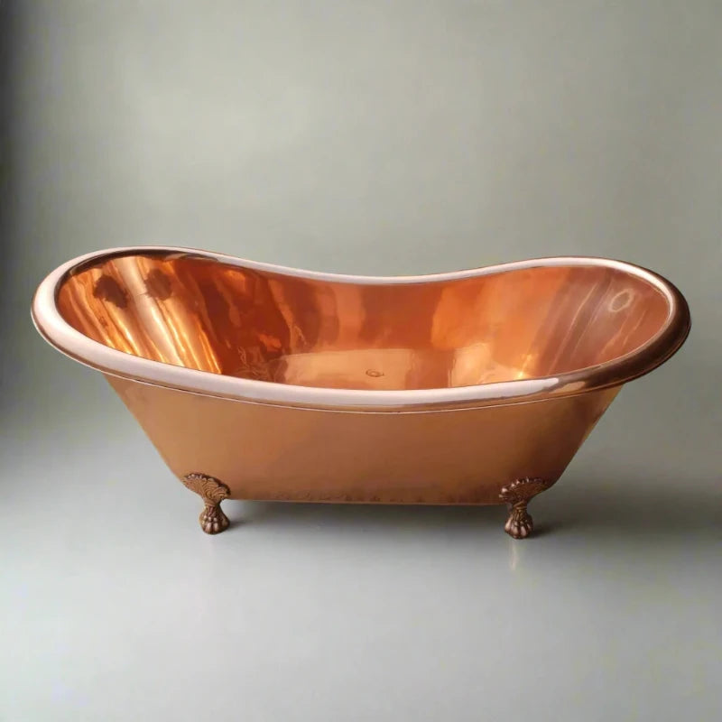 Coppersmith Creations Clawfoot Copper Bathtub featuring a full shiny copper finish inside and outside. The elegant design includes classic clawfoot legs, adding a luxurious touch to any bathroom.