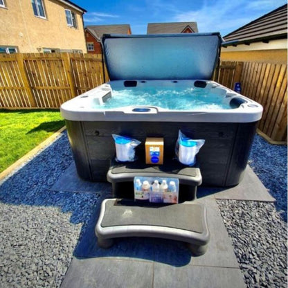 H2O 4500 in.temp Series 32A Hot Tub 2150 x 2150 x 900 mm in back garden with steps