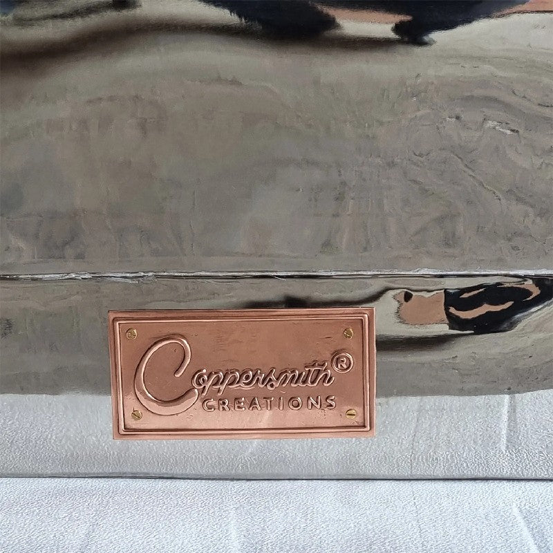 Coppersmith Creations Straight Base Copper Bathtub Full Nickel Finish 1700mm close up view of the base logo plate