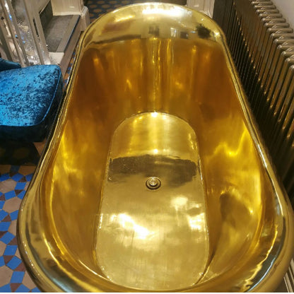 Coppersmith Creations Straight Base Brass Bathtub Full Polished Brass Finish 1700mm top view next to radiator